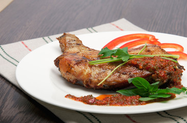 Tasty grilled chicken with pepper sauce