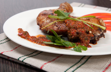 Tasty grilled chicken with pepper sauce