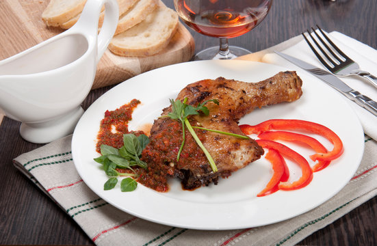 Tasty grilled chicken with pepper sauce