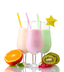 Milk shakes with fruits isolated on white