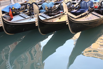 Fototapeta na wymiar Venetian gondola parked near San Marco square (Venice, Italy)