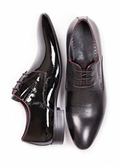 Two black men shoes over white, view from above