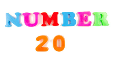 number 20 written in fridge magnets