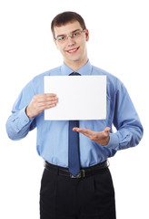 Young businessman holding blank board, isolated on white backgro