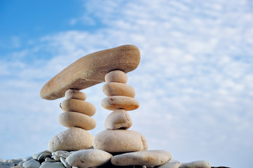 Pebbles and cloudy sky