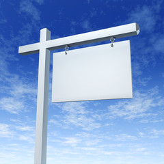 Blank White Real Estate Sign On a Blue Sky