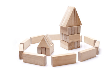 Wooden toy blocks on white background