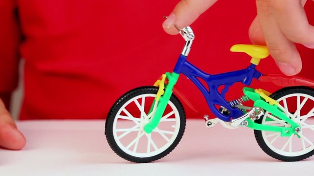 Boy play with toy bike