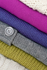 Stack of colorful sweaters