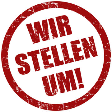 Grunge Stempel rot WIR STELLEN UM!