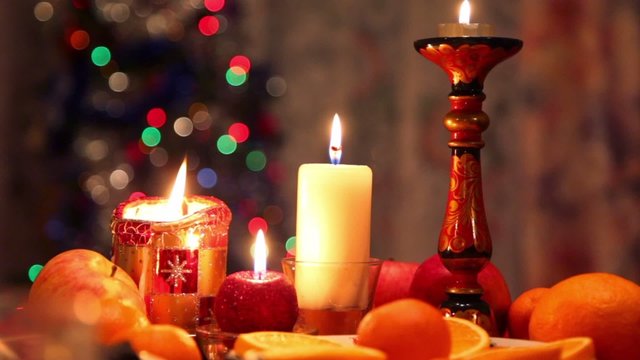 Decorated christmas dining table with candles