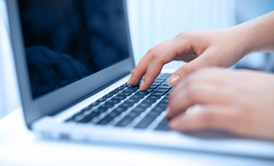 Close-up of typing hands