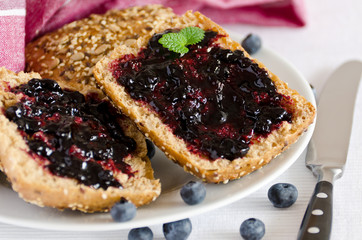 Breakfast arrangement with buns and blueberry jam