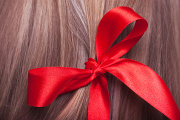 Red bow in a hair