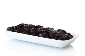 yummy dried plums in packaging isolated on white