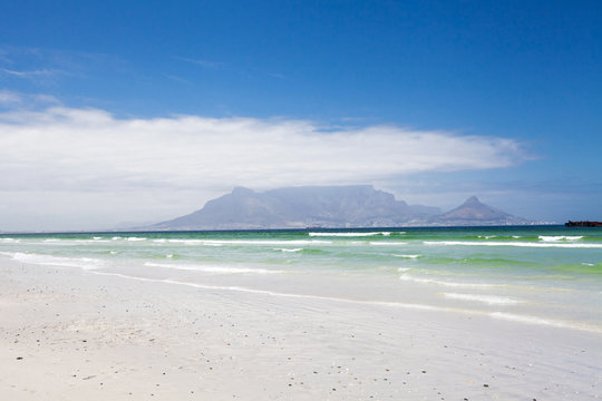 table mountain view from bloubergstrand beach, south africa