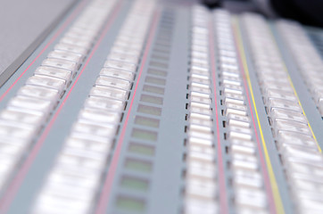 Close up of sound adjusting buttons