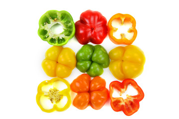 Orange,Yellow,Green and red colored pepper slices