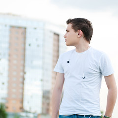 Fototapeta premium Portrait of young attractive man at park