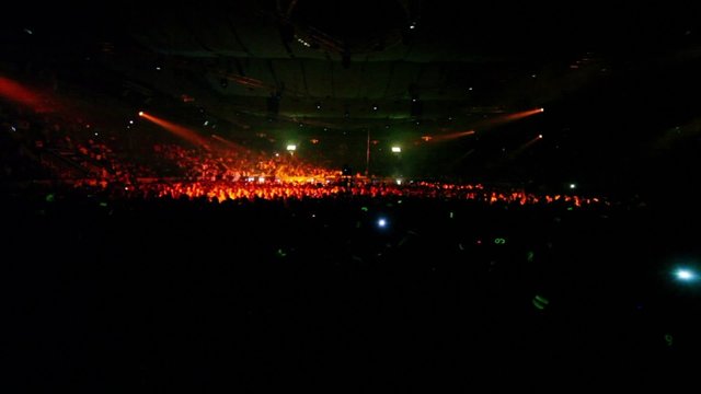 Many people dance at rave party