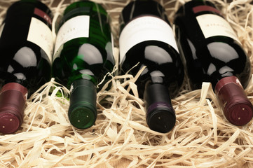Wine bottles in straw