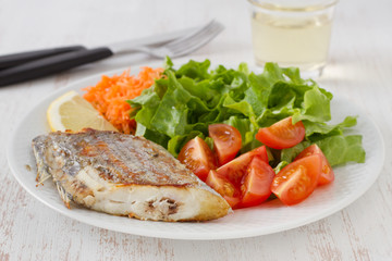 fried swordfish with salad