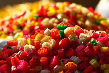 Multicolored pasta in traditional market in India.