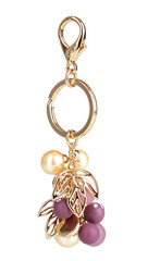 beautiful golden keychain with precious stones isolated on white