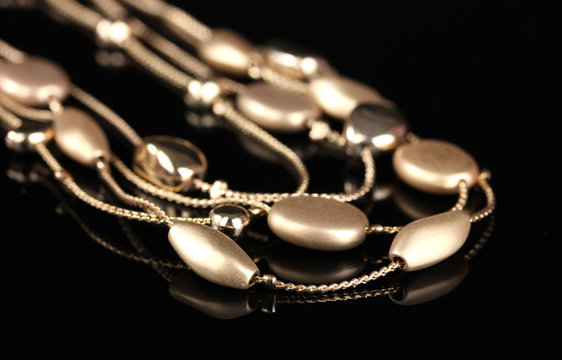 Beautiful Gold Necklace On Black Background