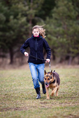 Master and her obedient (German shepherd) dog