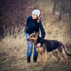 Master and her obedient (German shepherd) dog