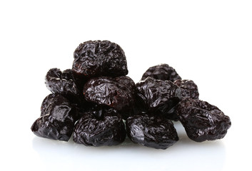 yummy dried plums isolated on white