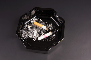 cigarette butts in an ashtray