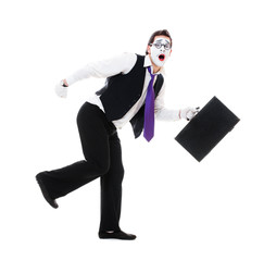 mime with hand luggage running