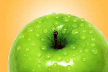 Fresh apple with water droplets