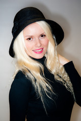 Beautiful blonde woman wearing hat