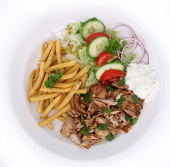 Gyros with french fries and vegetables