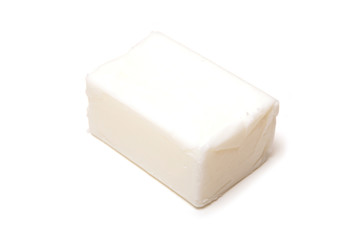 Beef dripping isolated on a white studio background.