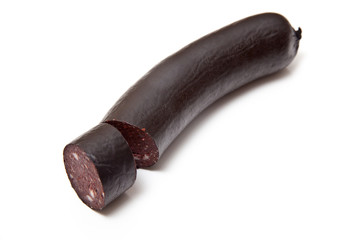 Black pudding sausage on a white studio background.