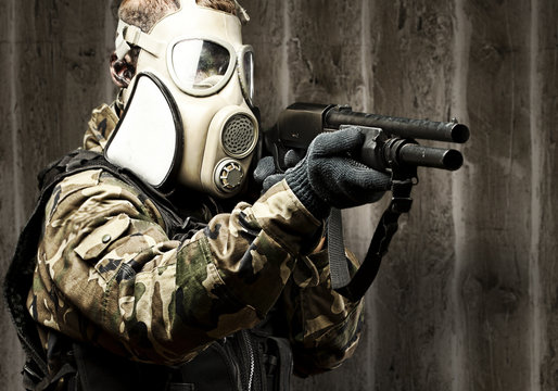 young soldier aiming