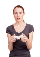 Pretty girl with gamepad playing