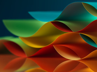 curved, colorful sheets paper with mirror reflexions