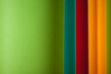 detail of curved, colored sheets of paper