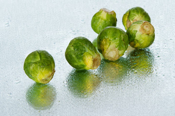 Brussels sprout on wet surface