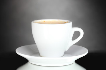 cup of coffee on gray background