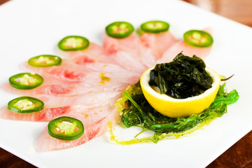 Beautiful, fresh raw fish with jalapeno pepper