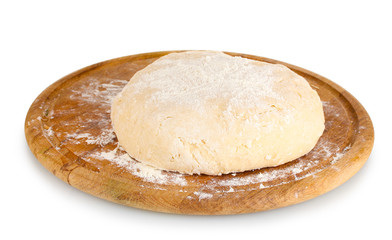 Dough on wooden board isolated on white