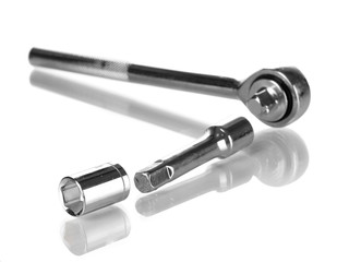 Socket wrench with nozzles isolated on white