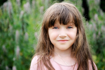 Portrait of beautiful child girl outdoors