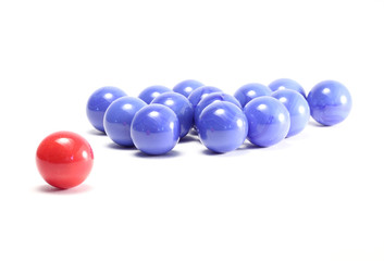 single red ball and blue balls